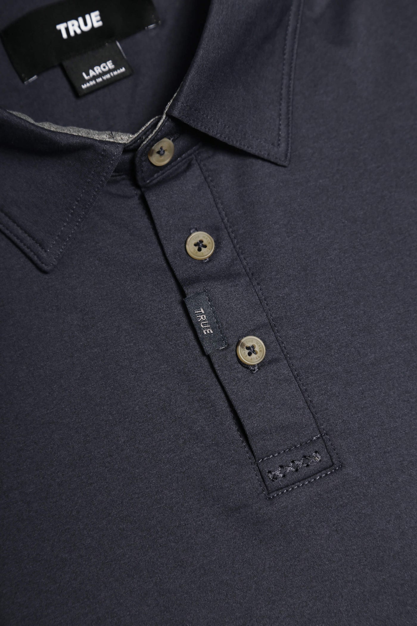 Edel Golf x TRUE linkswear All Day Heather Navy Polo - collar