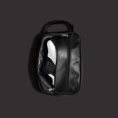 Edel Golf x Jones Sports black golf shoe bag with shoe in it