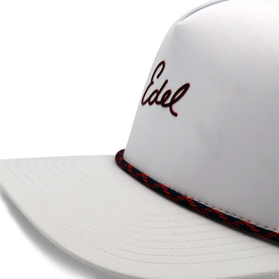 Close-up of Edel Golf Raised Signature White Rope Hat with Black and Red Accents